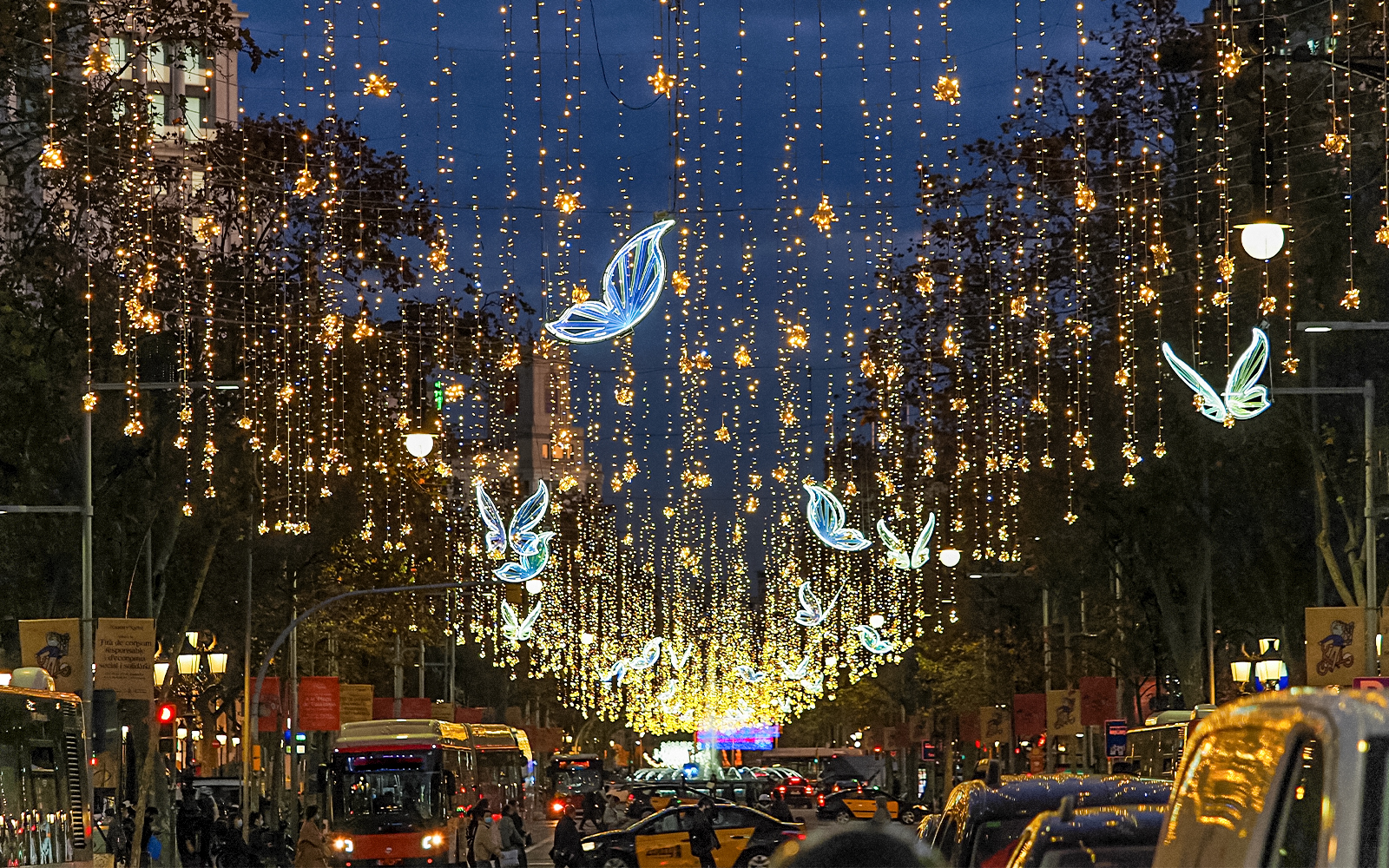Passeig de Gràcia street view with decorations in Barcelona, Spain.