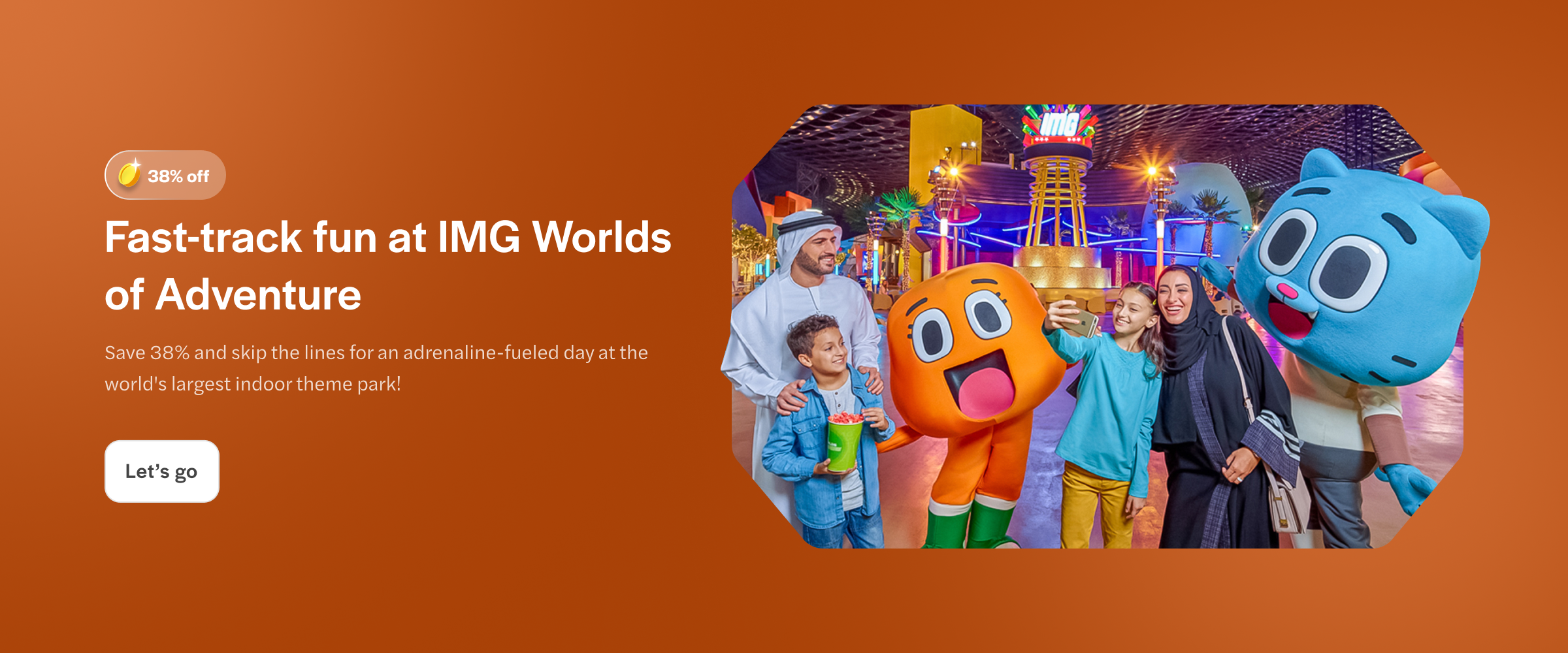 Visitors enjoying IMG Worlds of Adventure in Dubai with cartoon mascots.