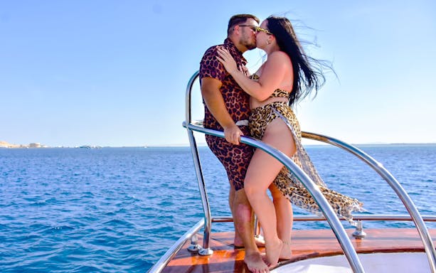 Couple on boat during Orange Bay Island snorkelling trip, Hurghada.