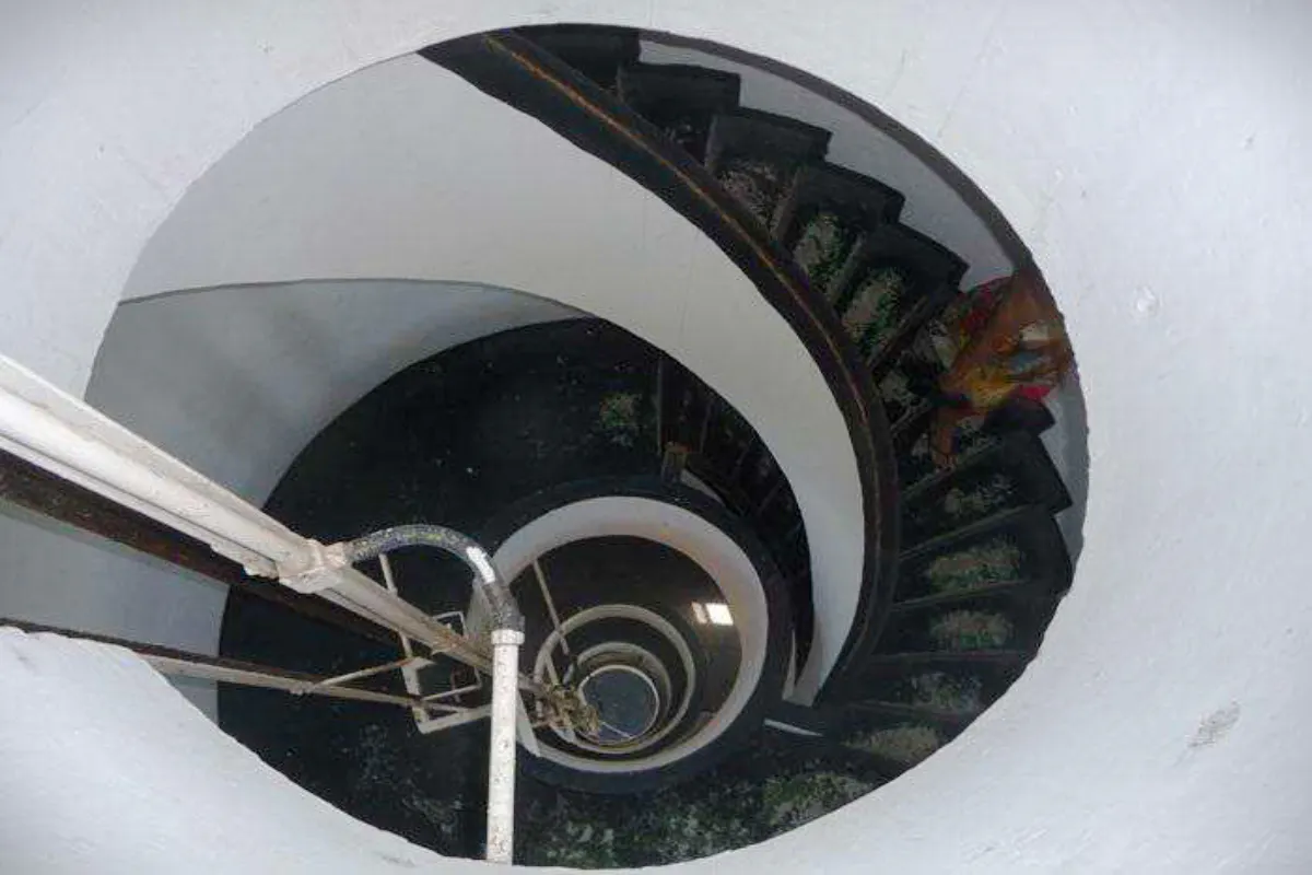 Spiral staircase inside Mandacaru Lighthouse, part of Preguiças River Circuit tour.