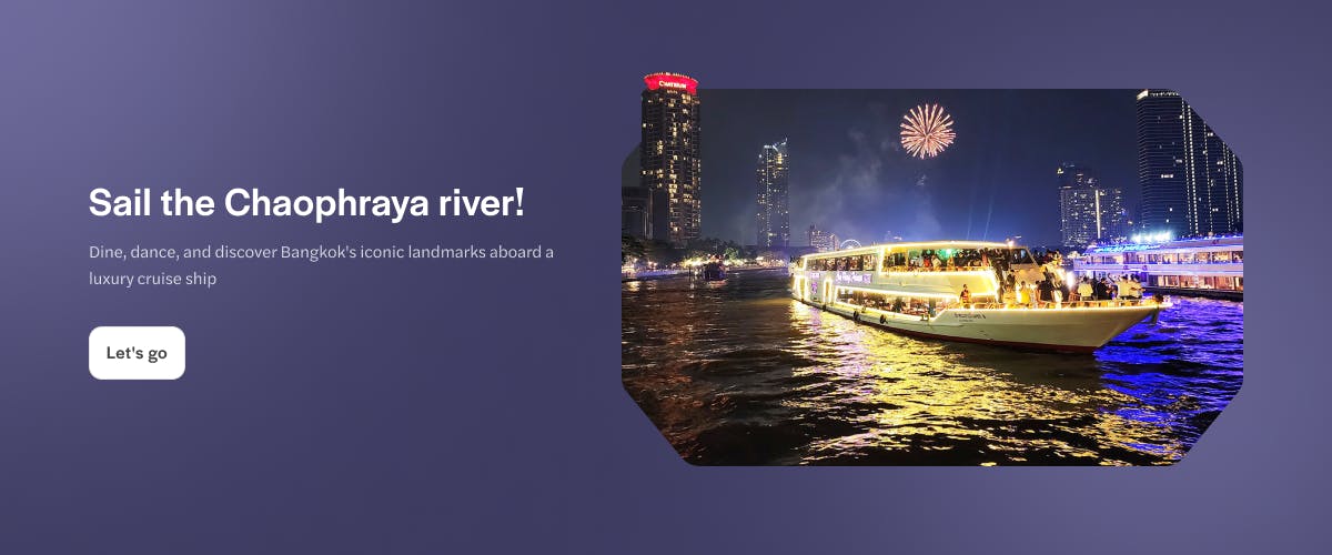 Cruise ship on Chao Phraya River with Bangkok skyline and fireworks in the background.
