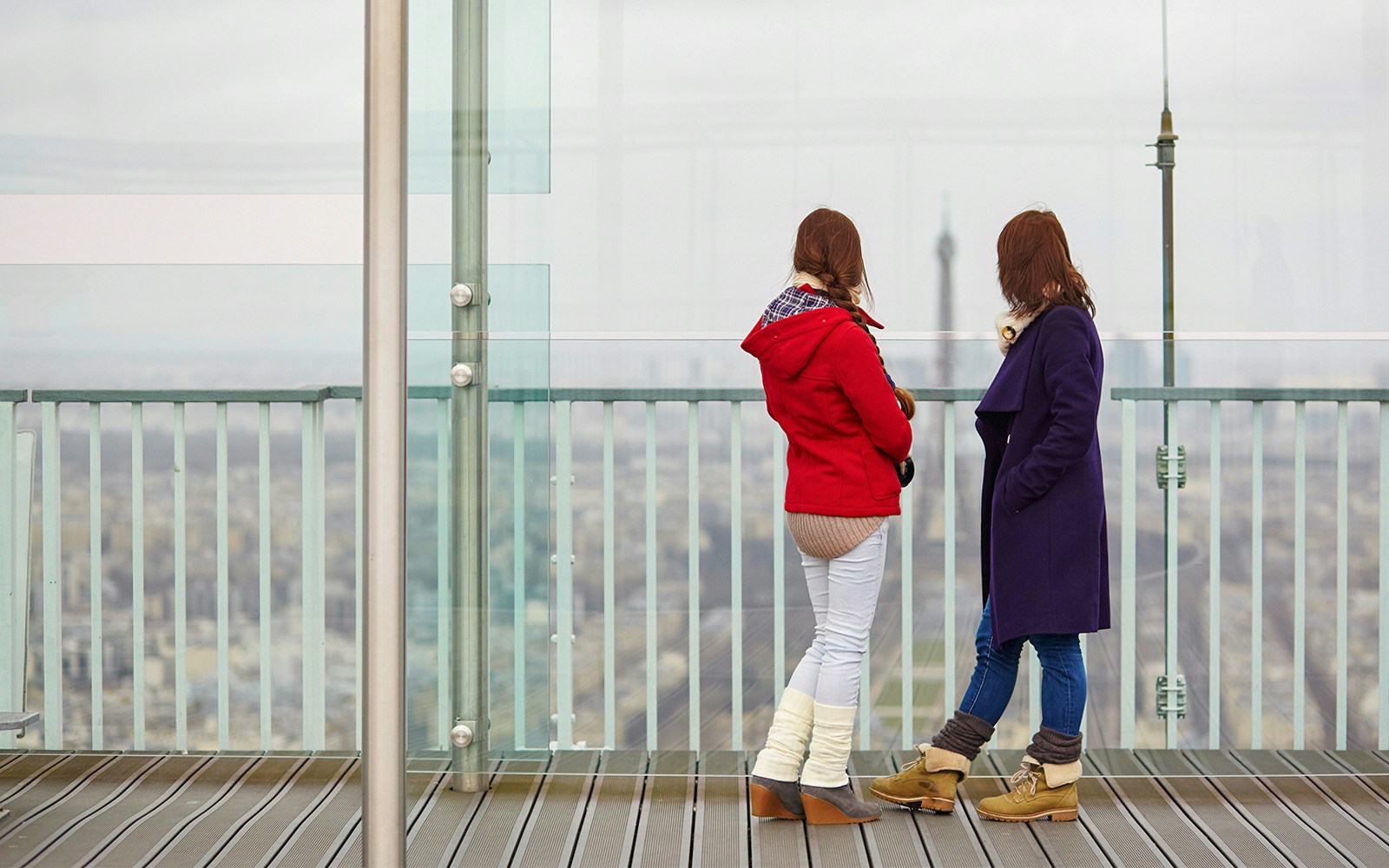 Visitors on Montparnasse Tower 56th Floor Roof Terrace, Paris.