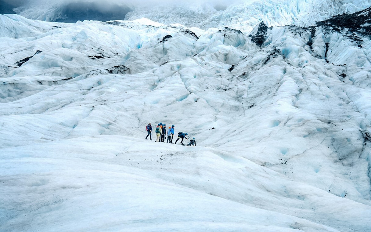 Group hiking on Vatnajökull Glacier, Iceland.