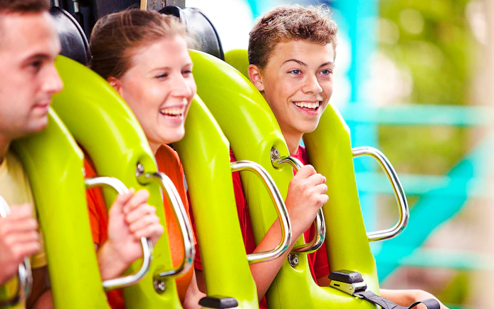 Riders enjoying the Raptor roller coaster at Cedar Point.