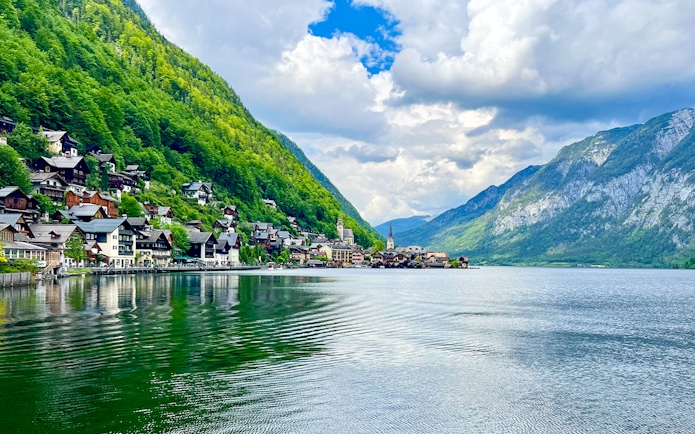 Hallstatt village by the lake with mountains, seen on a day trip from Vienna by bus.