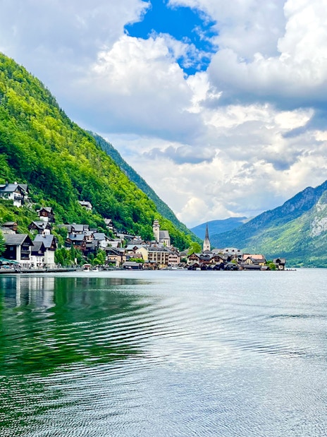 Hallstatt village by the lake with mountains, seen on a day trip from Vienna by bus.
