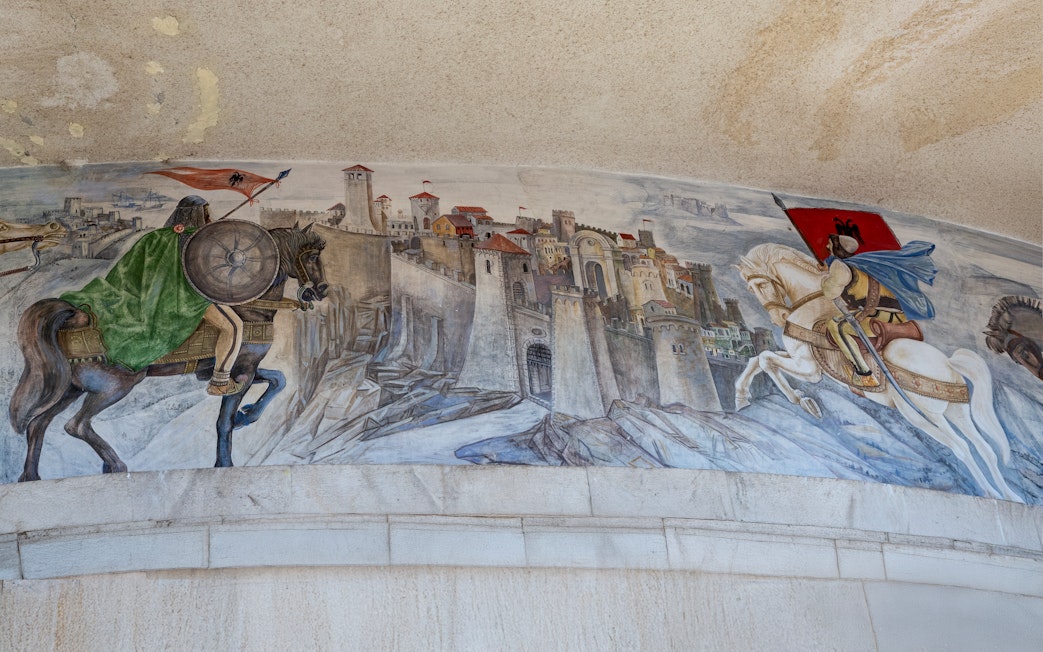 Mural depicting historical battle scene at the Skanderbeg Museum in Kruja, Albania.