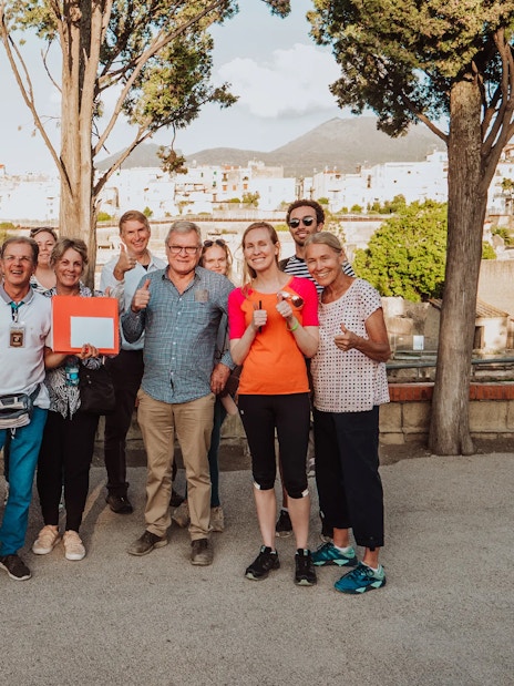 Group of tourists on a guided tour at Herculaneum with skip-the-line tickets.
