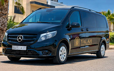 Tangier private car service with black Mercedes van in Morocco.