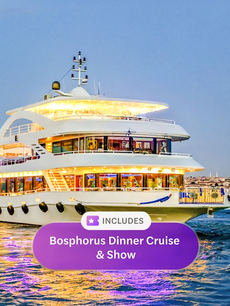 Cruise ship on Bosphorus strait during evening, Istanbul skyline in background.