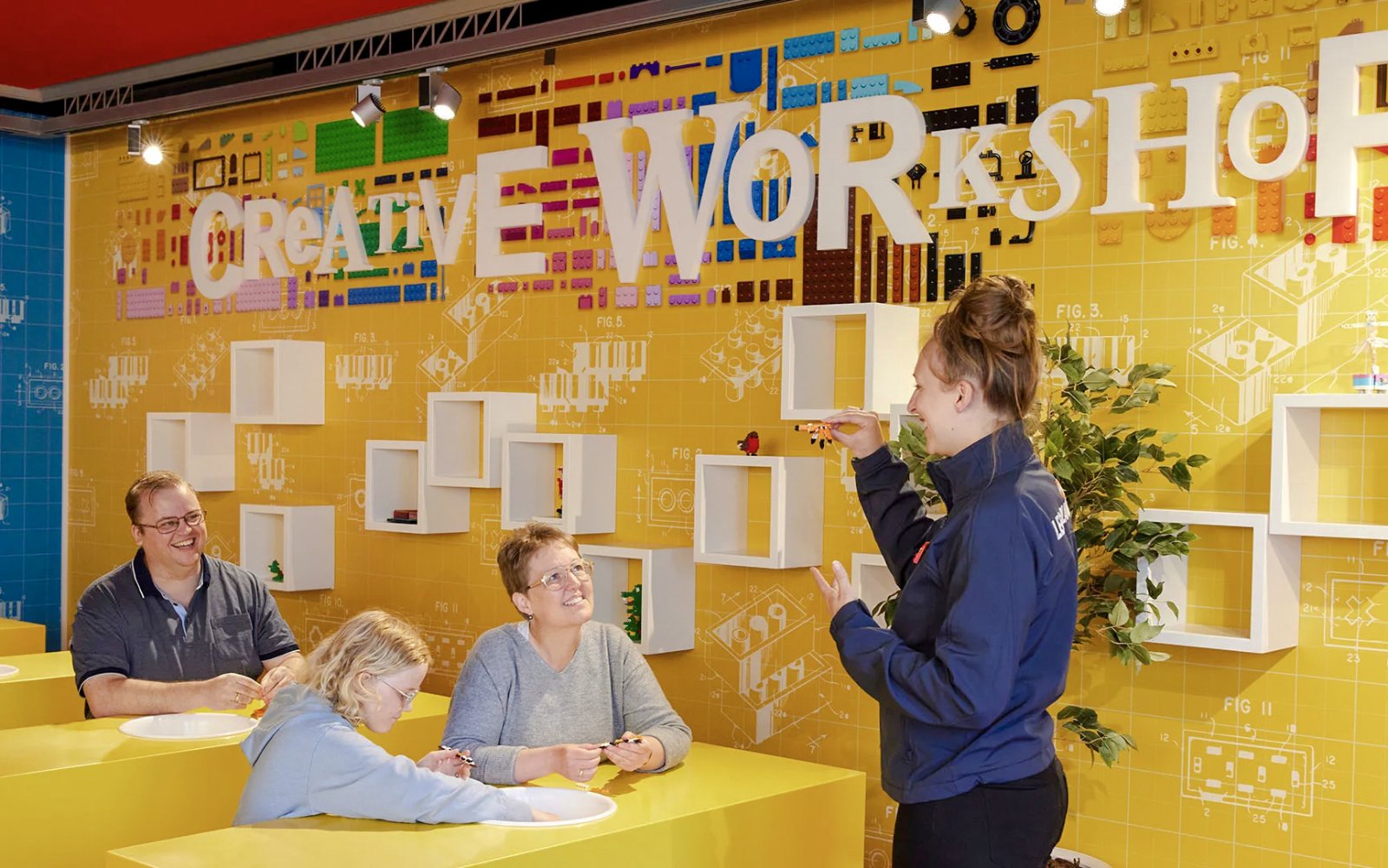 Guests participating in a creative workshop at LEGOLAND Billund.
