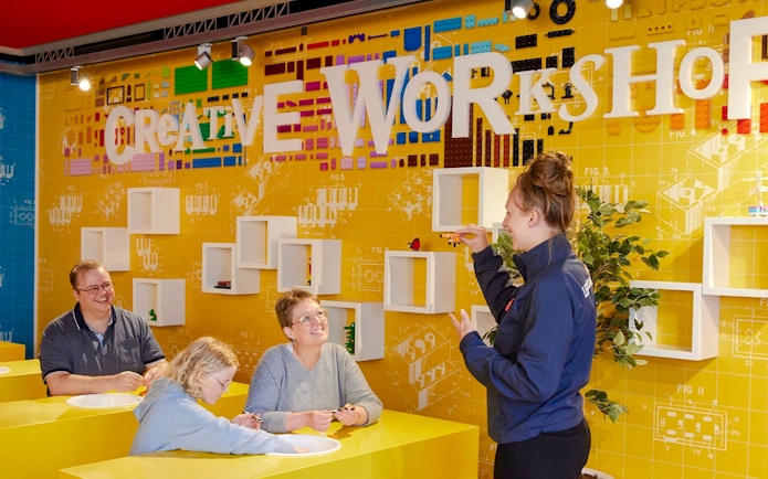 Guests participating in a creative workshop at LEGOLAND Billund.