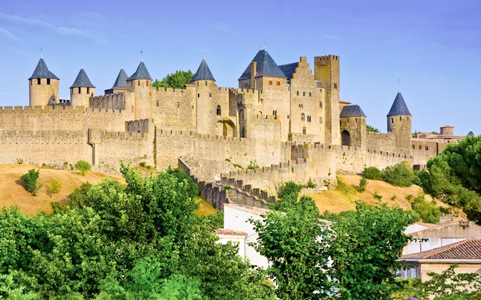 Carcassonne medieval fortress with towers and walls on a sunny day.