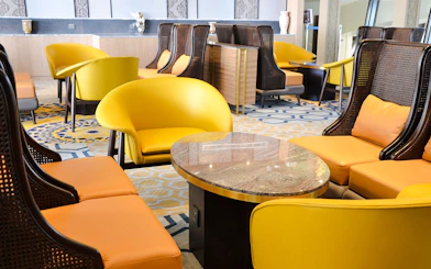 Plaza Premium Lounge seating area at King Abdulaziz International Airport.