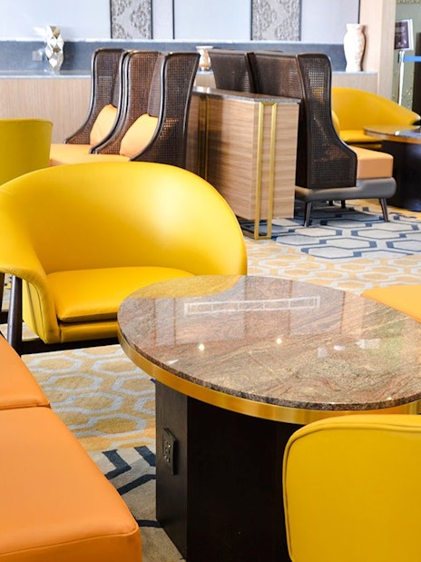 Plaza Premium Lounge seating area at King Abdulaziz International Airport.