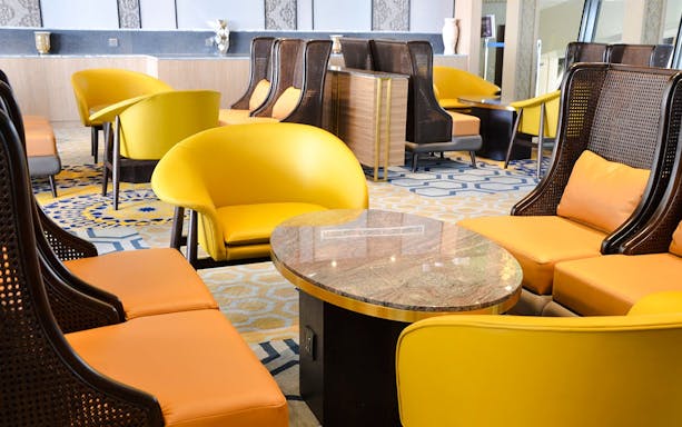 Plaza Premium Lounge seating area at King Abdulaziz International Airport.