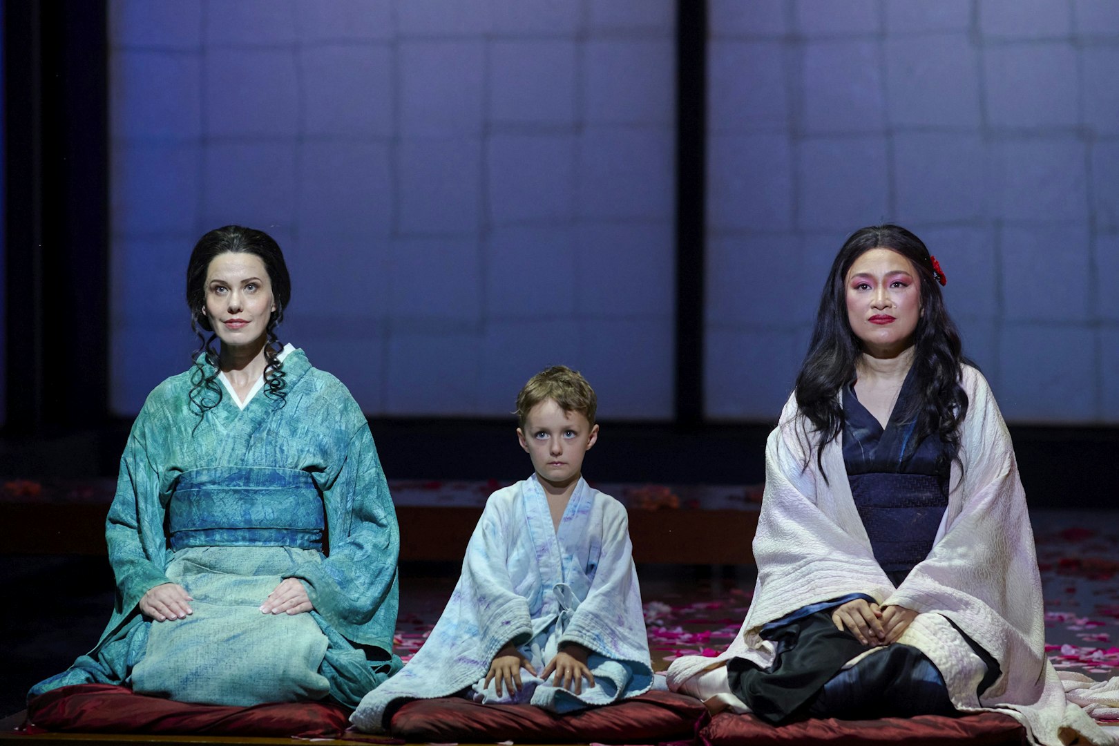 Stage performance of Madama Butterfly in Sydney with three actors in traditional attire.