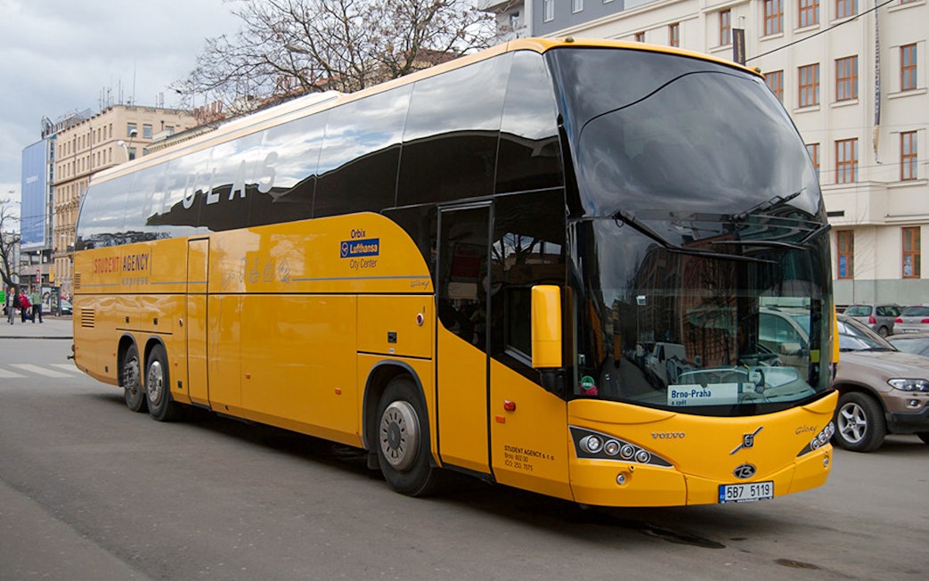 Yellow bus for Prague Airport to City Center transfer.