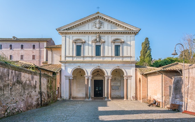 Basilica of San Sebastian facade in Rome with arched entrance and historical architecture.