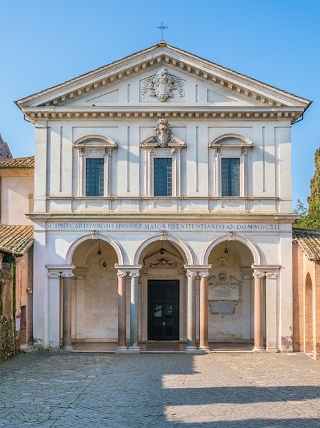 Basilica of San Sebastian facade in Rome with arched entrance and historical architecture.