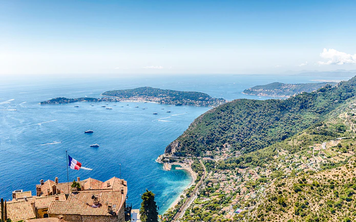 Aerial view of Èze village rooftops and coastline, Cote d'Azur, France.