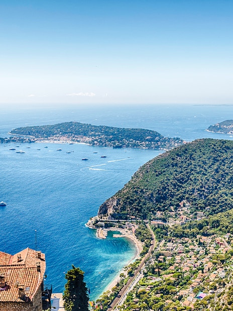 Aerial view of Èze village rooftops and coastline, Cote d'Azur, France.