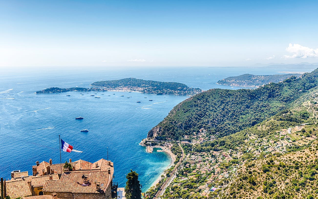 Aerial view of Èze village rooftops and coastline, Cote d'Azur, France.