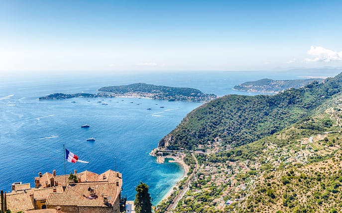 Aerial view of Èze village rooftops and coastline, Cote d'Azur, France.