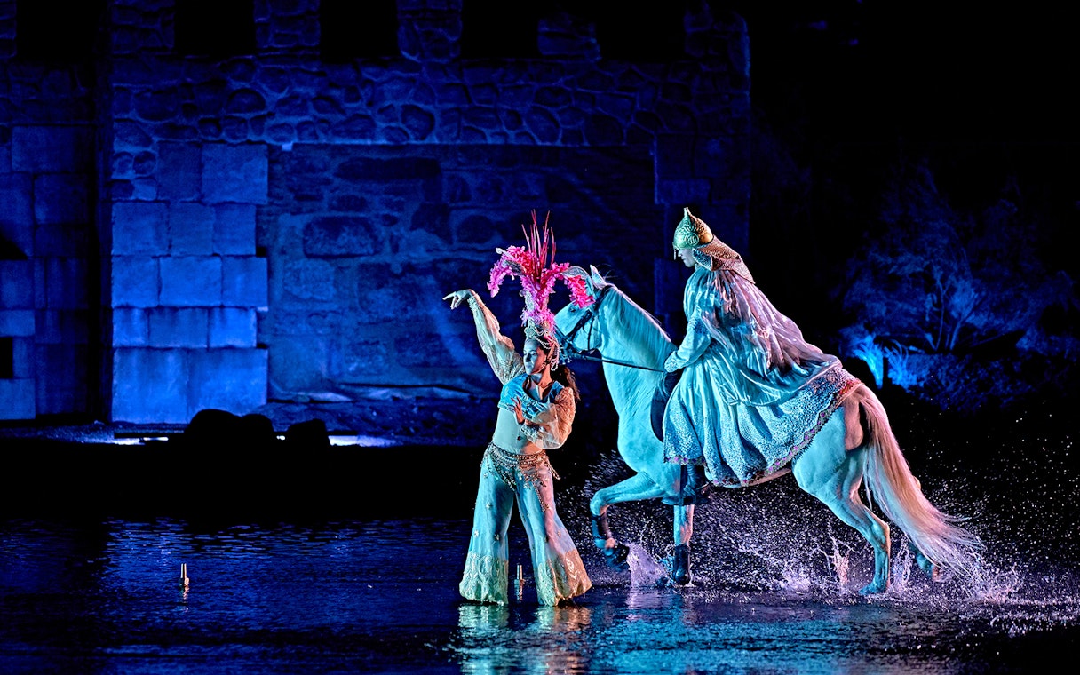 Performer and horse in Puy du Fou España night show.