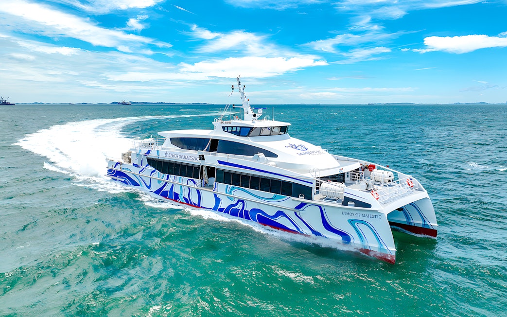 Ferry sailing from Singapore to Batam across blue ocean waters.