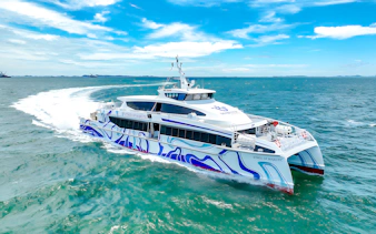 Ferry sailing from Singapore to Batam across blue ocean waters.