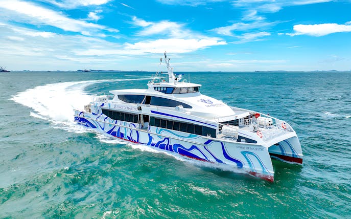 Ferry sailing from Singapore to Batam across blue ocean waters.
