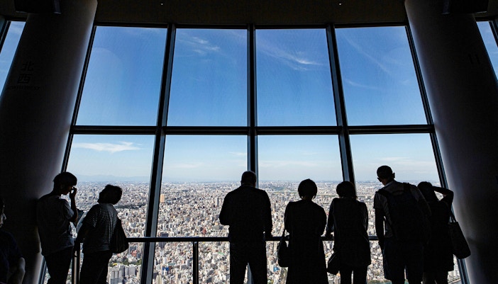 Tokyo Skytree towering over cityscape, view from observation deck.
