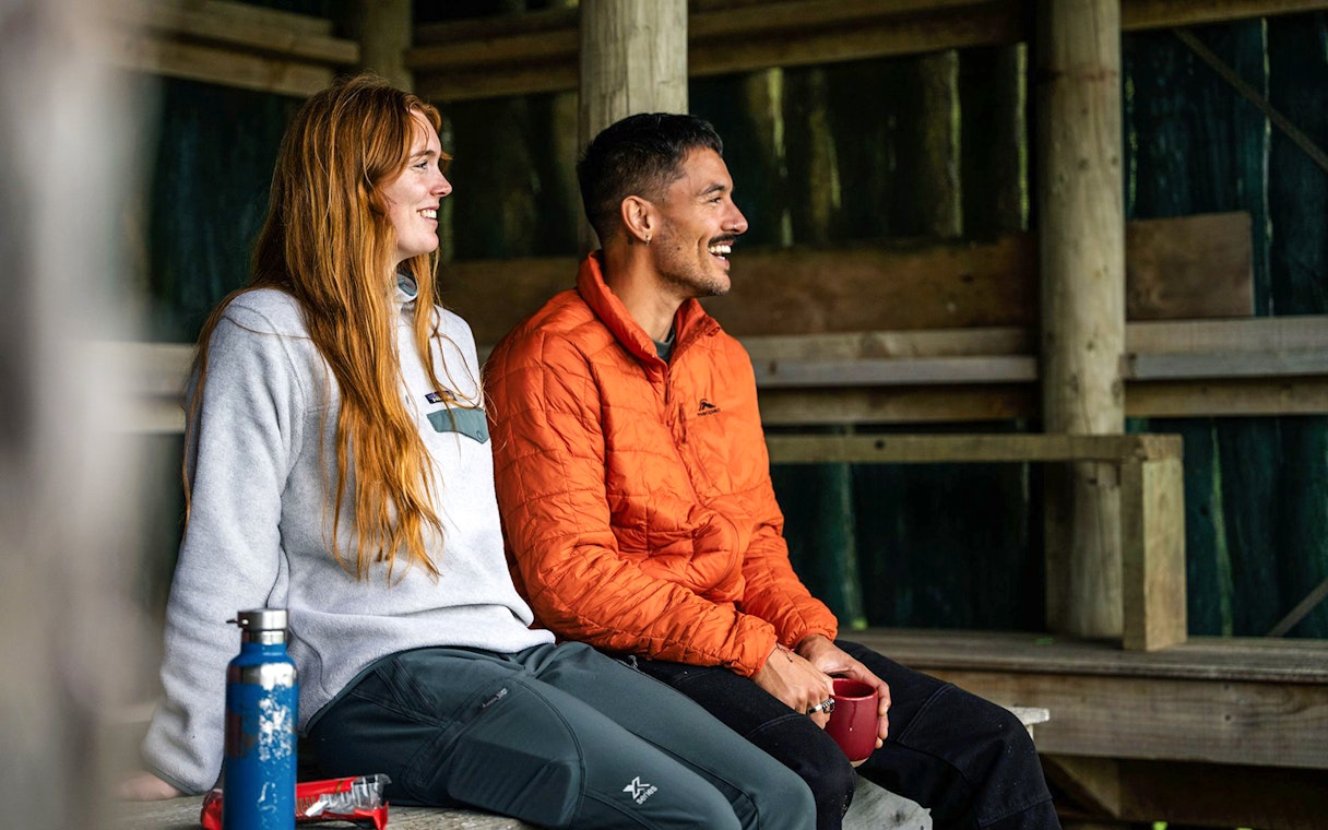 People enjoying a break during Stewart Island Guided Wilderness Walk.