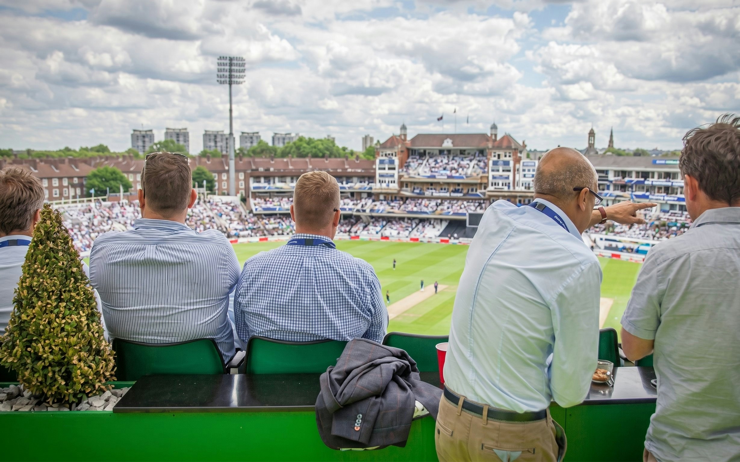 Spectators watching a cricket match at Kia Oval Stadium, London.