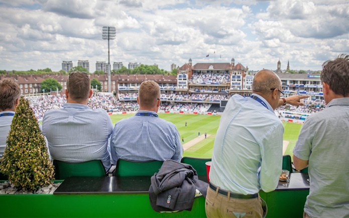 Spectators watching a cricket match at Kia Oval Stadium, London.