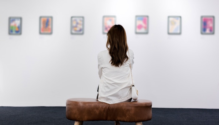 customer in National Gallery of Modern Art Museum - looking at painting