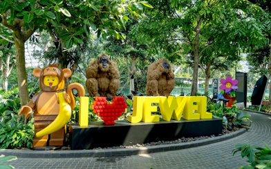 Jewel Canopy Park with LEGO sculptures and "I Love Jewel" sign.