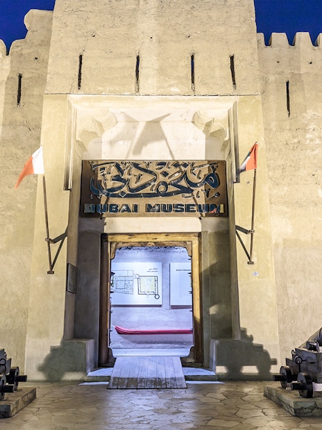 Dubai Museum entrance with cannons, part of Half Day Sightseeing Tour of Dubai.