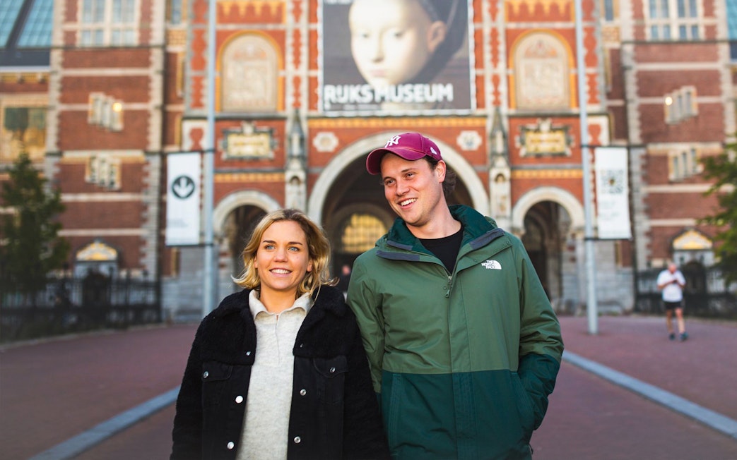Visitors outside the Rijksmuseum in Amsterdam during a professional photoshoot.