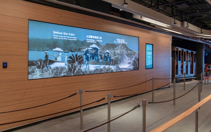Peak Tram station interior with historical display, Hong Kong.
