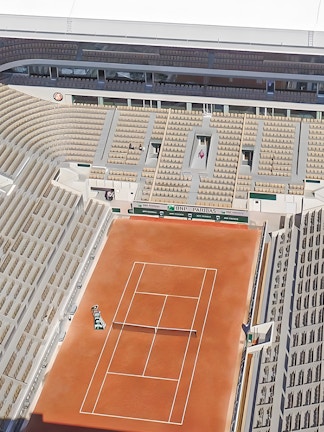 Roland-Garros Stadium clay court with empty stands in Paris, France.