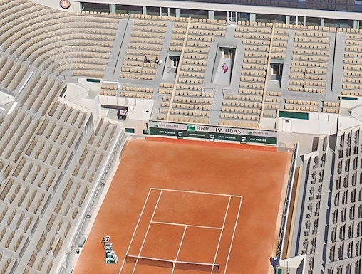 Roland-Garros Stadium clay court with empty stands in Paris, France.