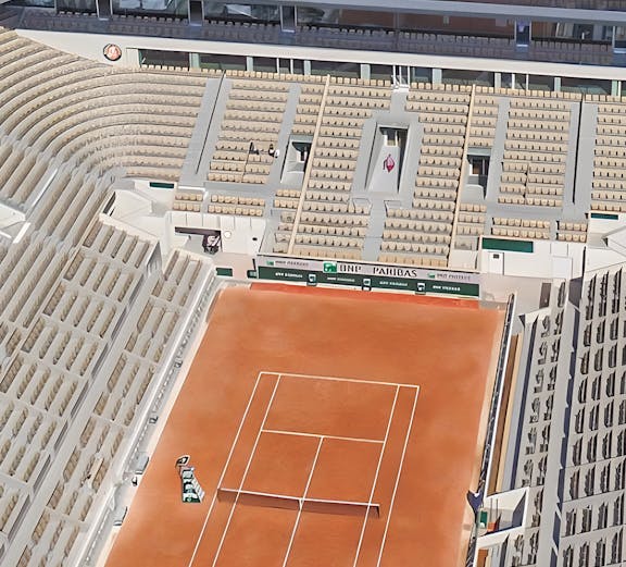 Roland-Garros Stadium clay court with empty stands in Paris, France.