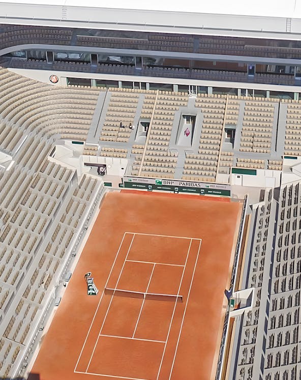 Roland-Garros Stadium clay court with empty stands in Paris, France.
