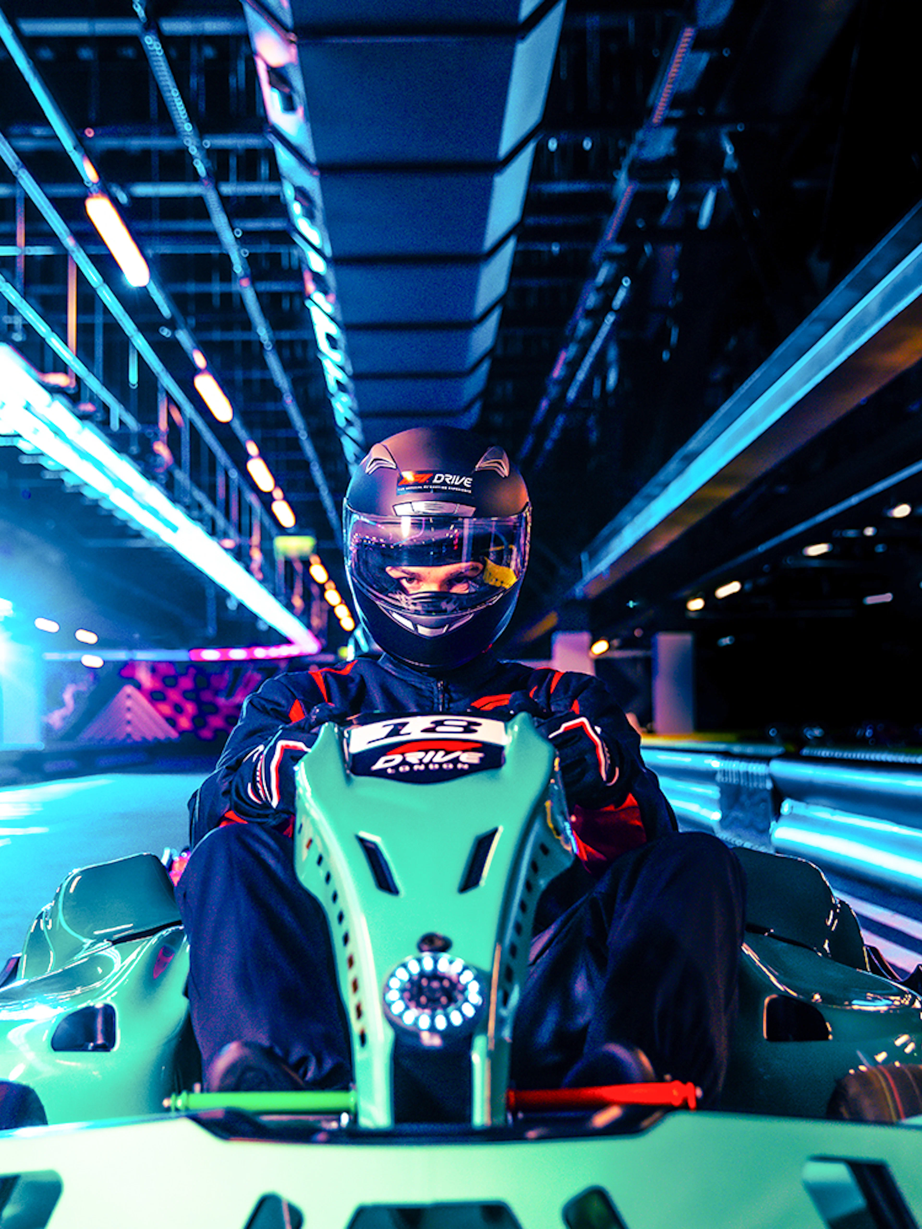 Guest driving at Elite F1 Drive experience in London indoor track.