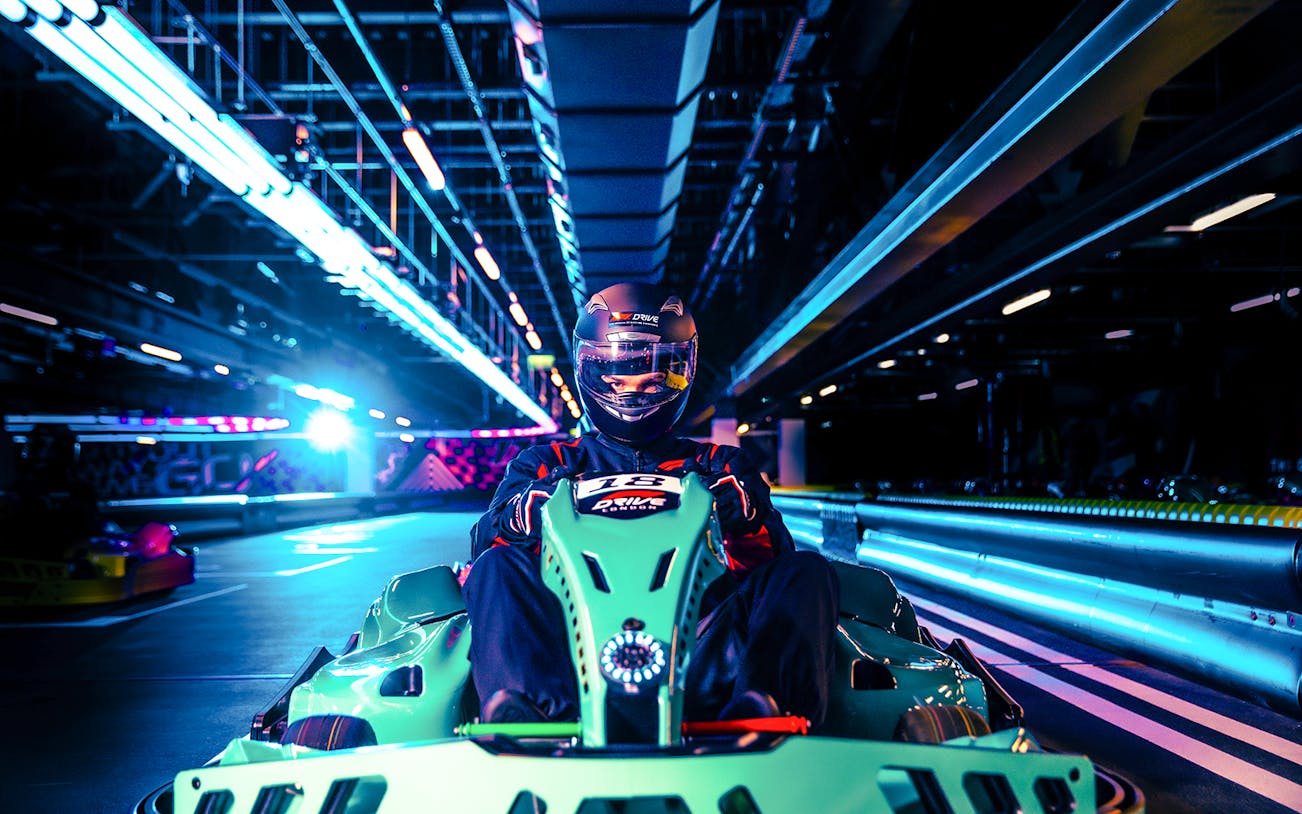 Guest driving at Elite F1 Drive experience in London indoor track.