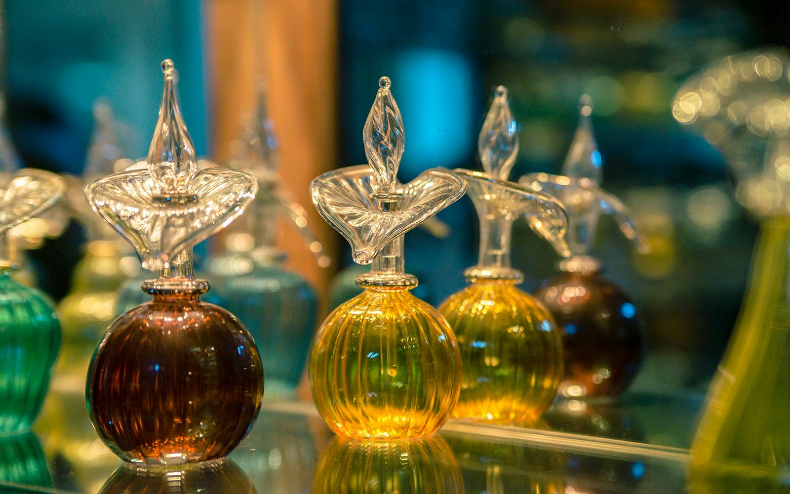 Colorful glass perfume bottles at Khan el-Khalili market, Cairo.