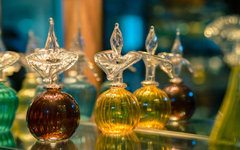 Colorful glass perfume bottles at Khan el-Khalili market, Cairo.