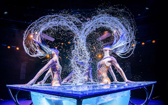 Performers in water tank during WOW: The Vegas Spectacular show.